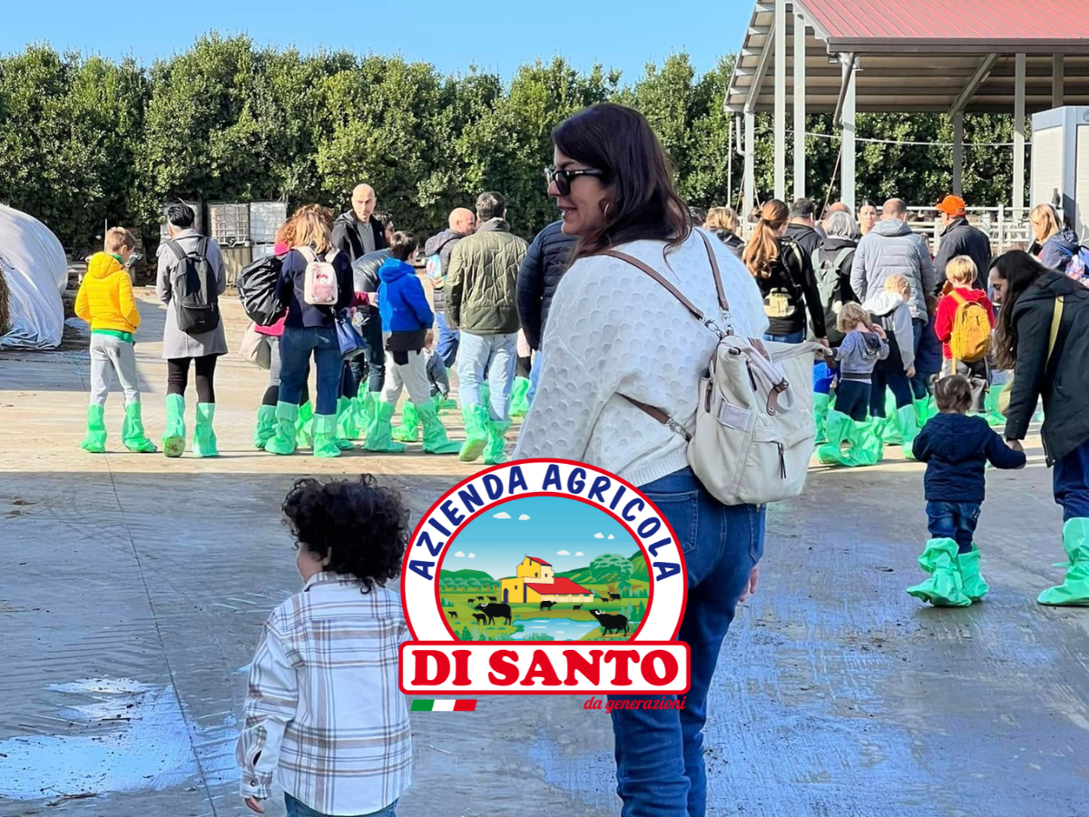 The Di Santo family welcoming guests for the Mozzarella farm tour near Naples.